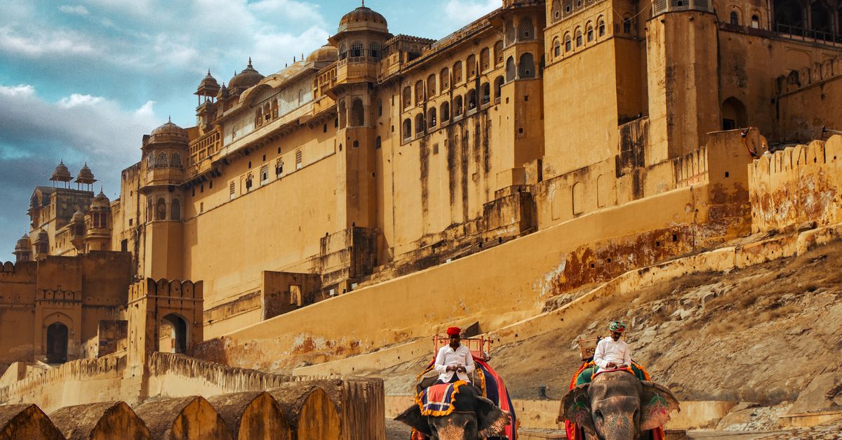 Explore the grandeur of Amber Fort in Jaipur with traditional elephant rides beneath its ancient walls.