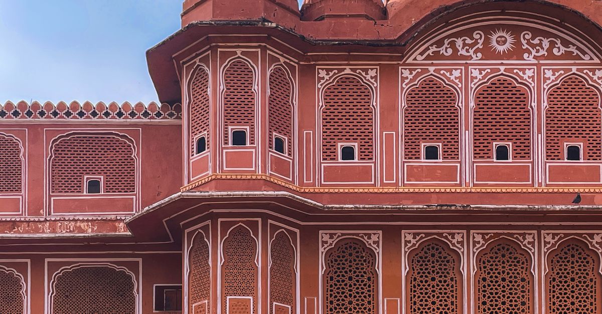 Captivating intricate architectural details of Hawa Mahal, Jaipur in vibrant pink hues.